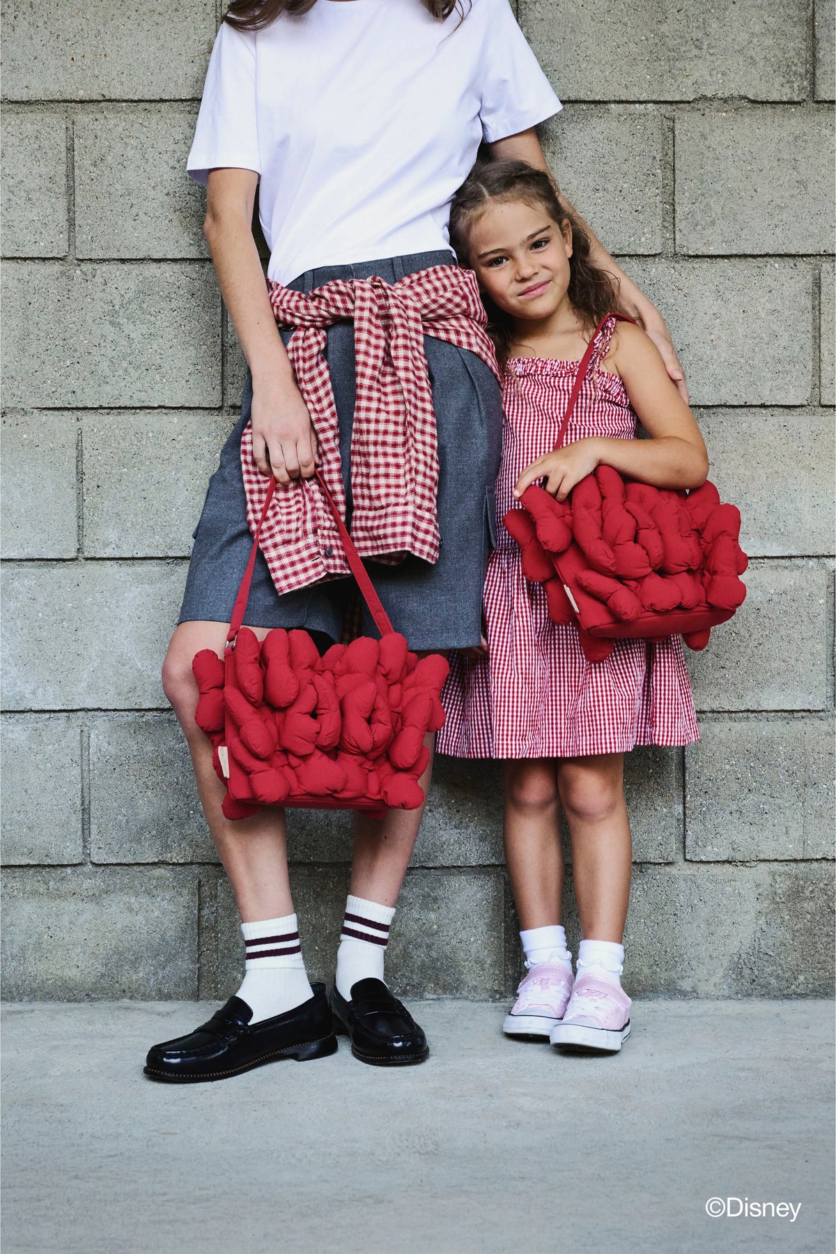 The Minnie Bow Handbag in Mickey Mouse Red
